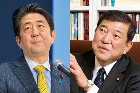 自民党総裁選挙に勝利した安倍晋三首相(左)と敗れた石破茂氏